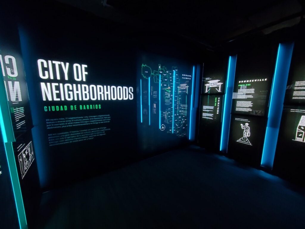 360 CHICAGO welcome experience, 875 North Michigan Avenue, Chicago — City of Neighborhoods exhibit wall