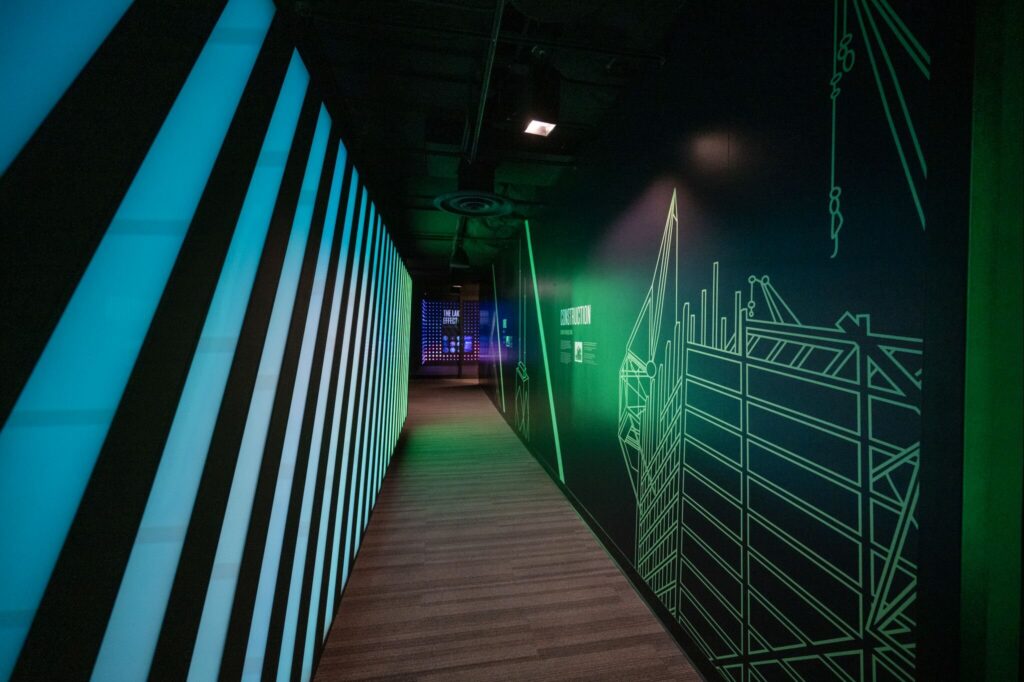 360 CHICAGO welcome experience, 875 North Michigan Avenue, Chicago — LED-lined corridor with skyline line art