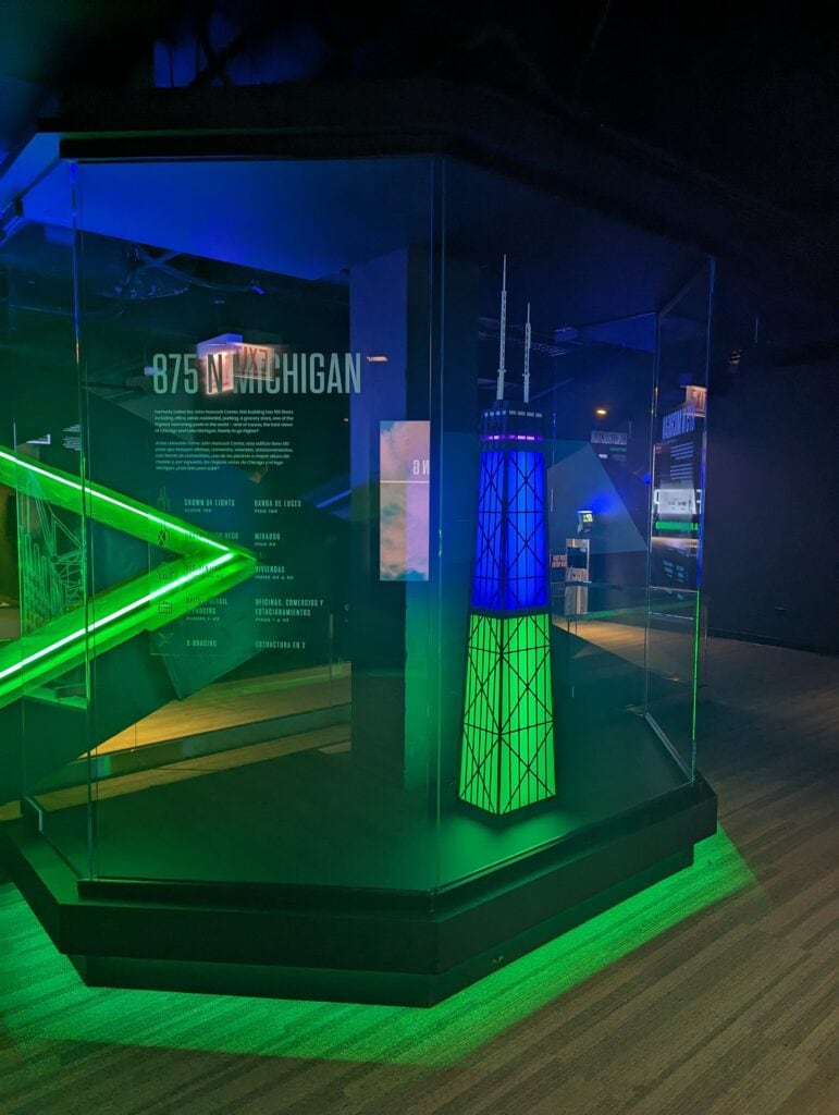360 CHICAGO welcome experience, 875 North Michigan Avenue, Chicago — X-bracing model display with green LED base