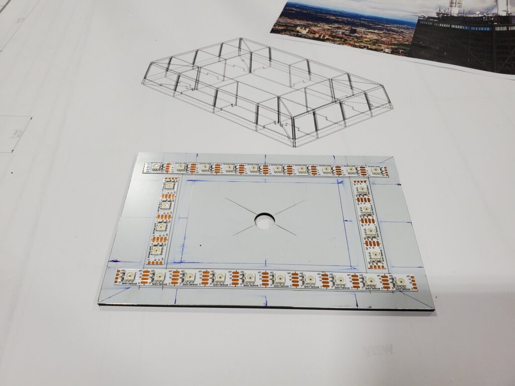 360 CHICAGO welcome experience, 875 North Michigan Avenue, Chicago — LED-lined model base in fabrication
