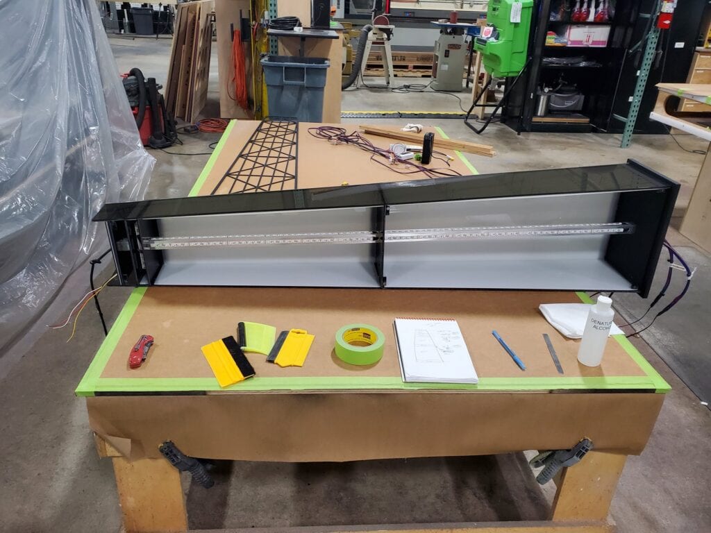 360 CHICAGO welcome experience, 875 North Michigan Avenue, Chicago — LED fixture assembly on the shop bench