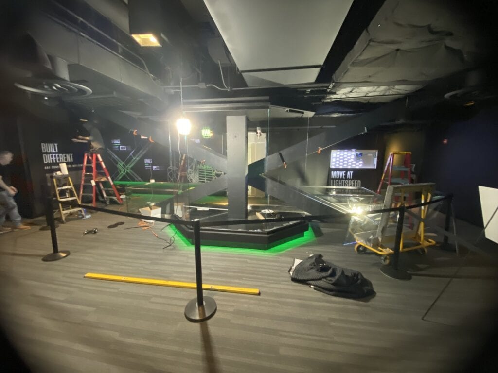 360 CHICAGO welcome experience, 875 North Michigan Avenue, Chicago — X-bracing platform install on site