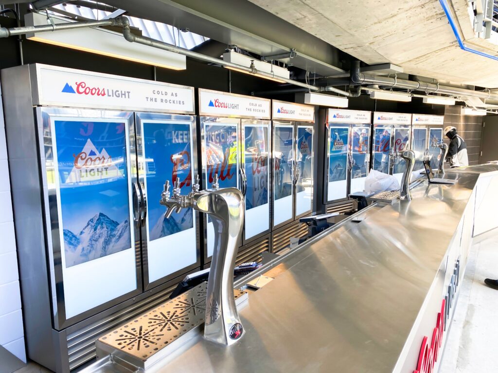 Coors Light cooler wall and tap station installed at an FC Cincinnati stadium bar