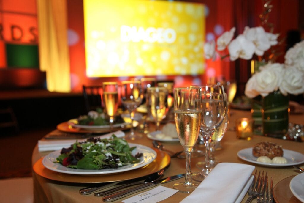 Table setting with champagne and candles at the Diageo Believe event