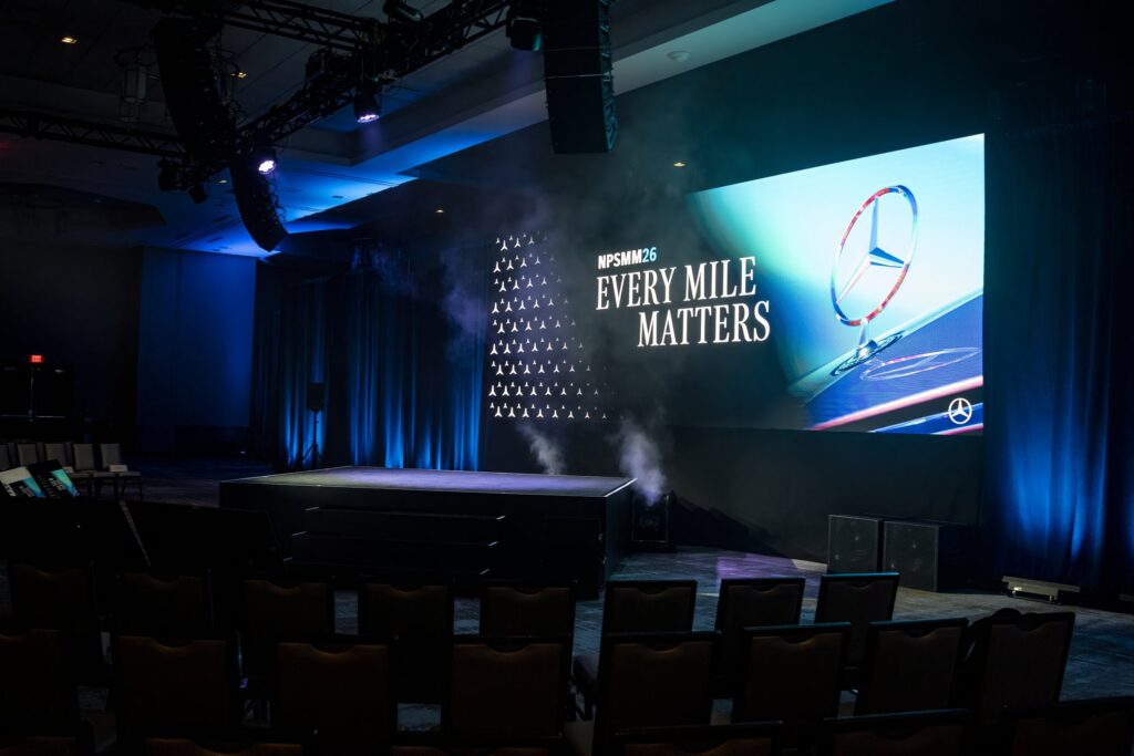 Mercedes-Benz NPSMM at Virgin Hotels Las Vegas — general session stage with ultra-wide LED and Every Mile Matters theme