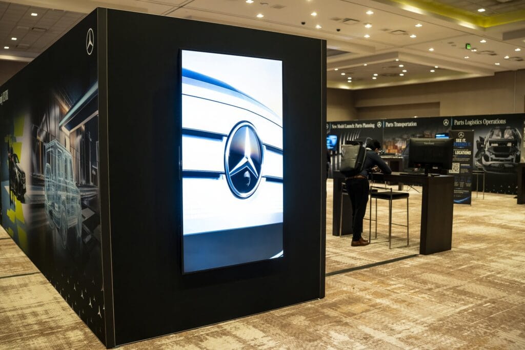 Mercedes-Benz NPSMM at Virgin Hotels Las Vegas — department booth with vertical LED display