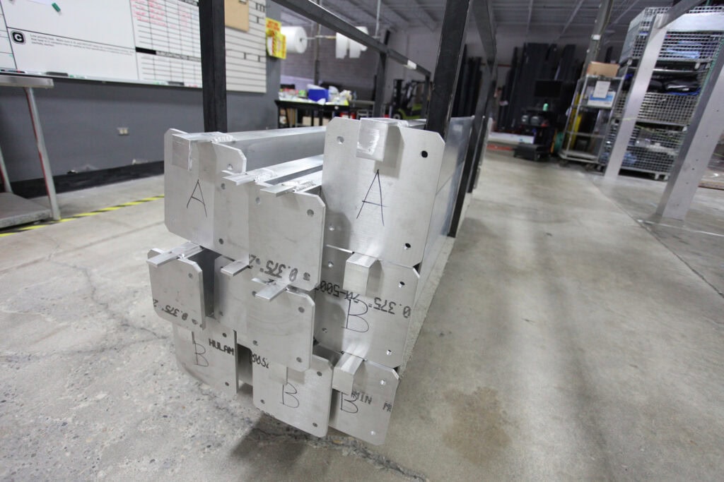 Modular aluminum components for a touring structure