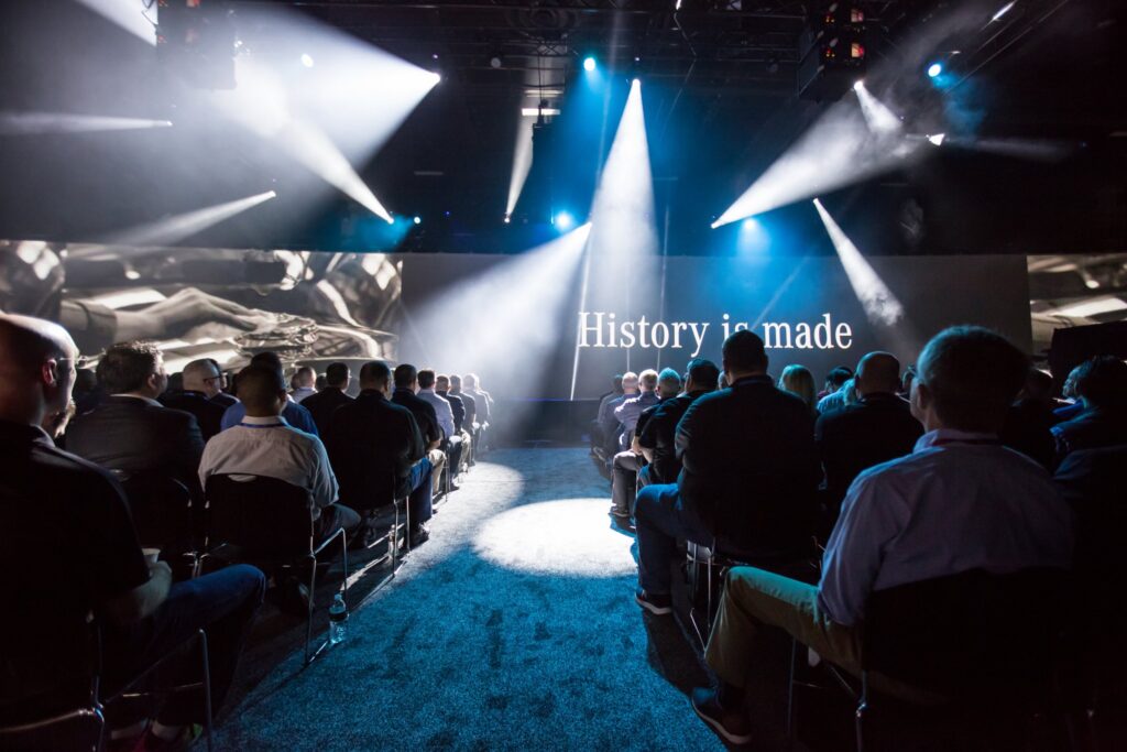 General session stage with lighting and LED screens