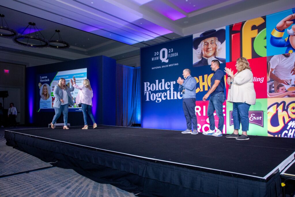 Quaker general session stage with brand graphics
